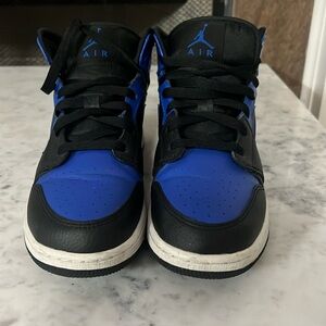 Blue and black Jordan ones high top